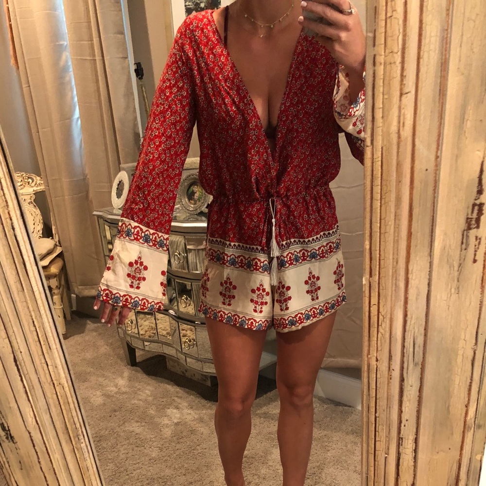 Red romper/cover up deep plunge bell sleeves